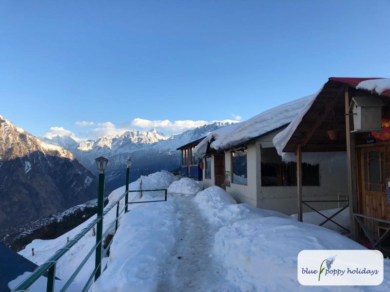 The path along the huts after fresh snow
