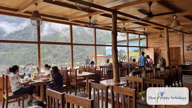 The dining room at Blue Poppy Premier with mountain views